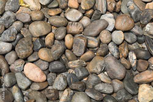 Sea pebbles background.