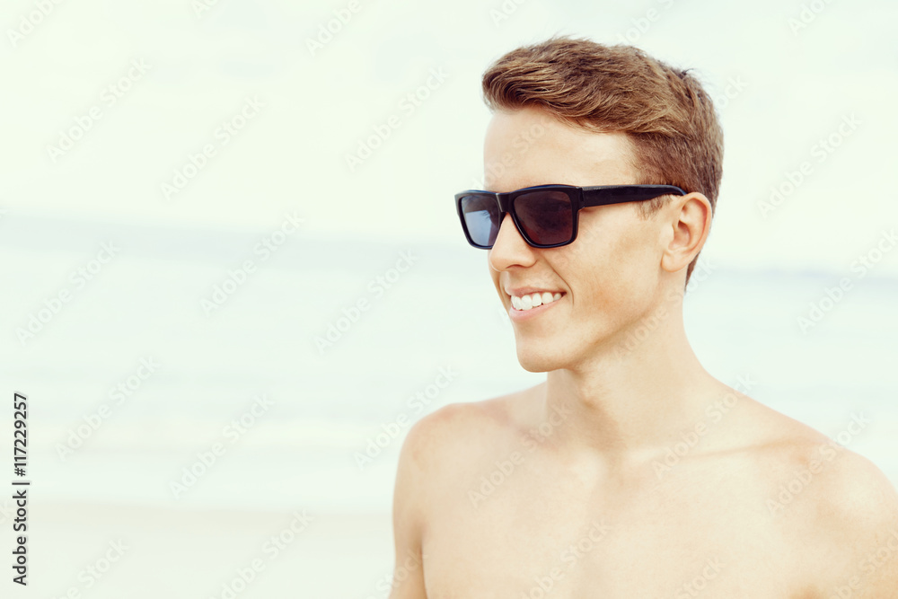 Handsome man posing at beach Handsome man posing at beach