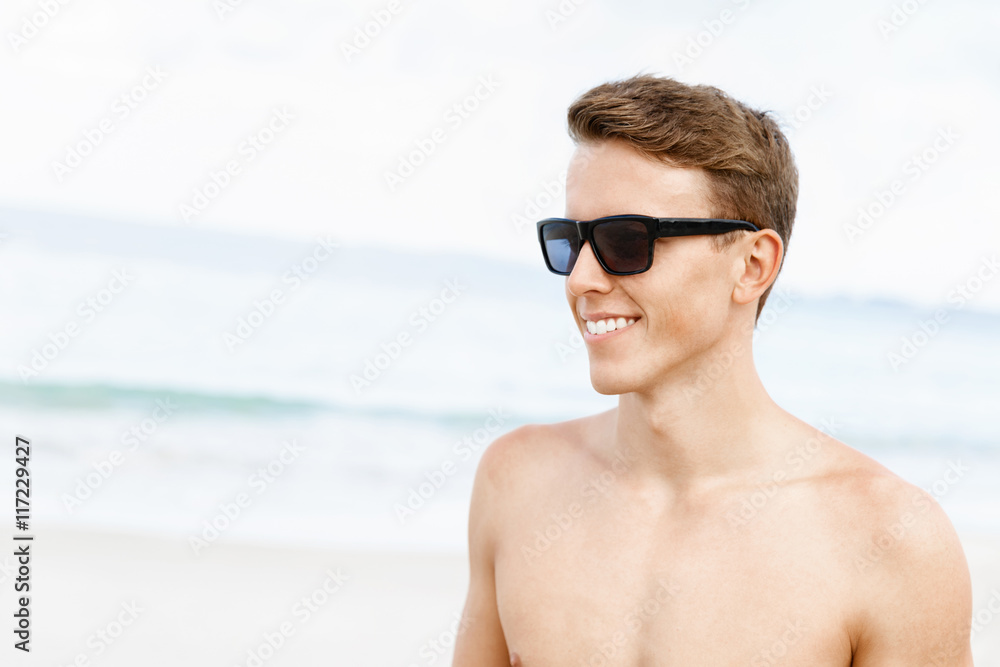 Handsome man posing at beach Handsome man posing at beach