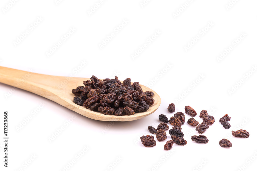 Raisin in wooden spoon isolated on white background Raisin in wooden spoon isolated on white background