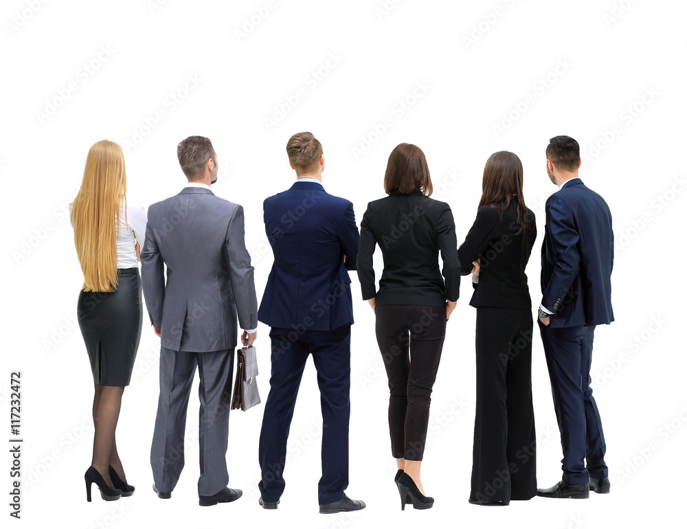Successful business team looking upwards standing back side Successful business team looking upwards standing back side