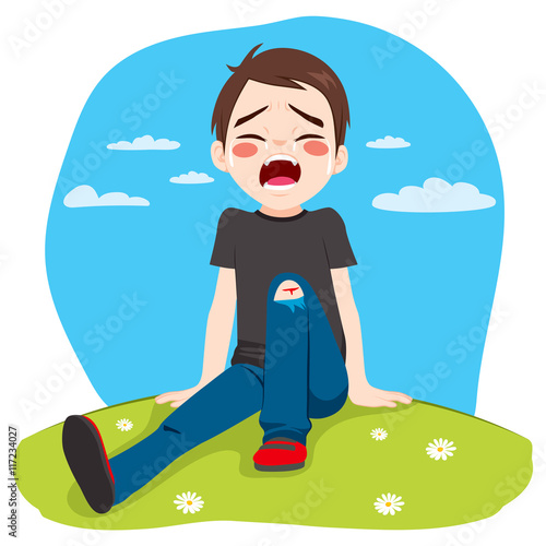 Little boy hurt crying after falling in park