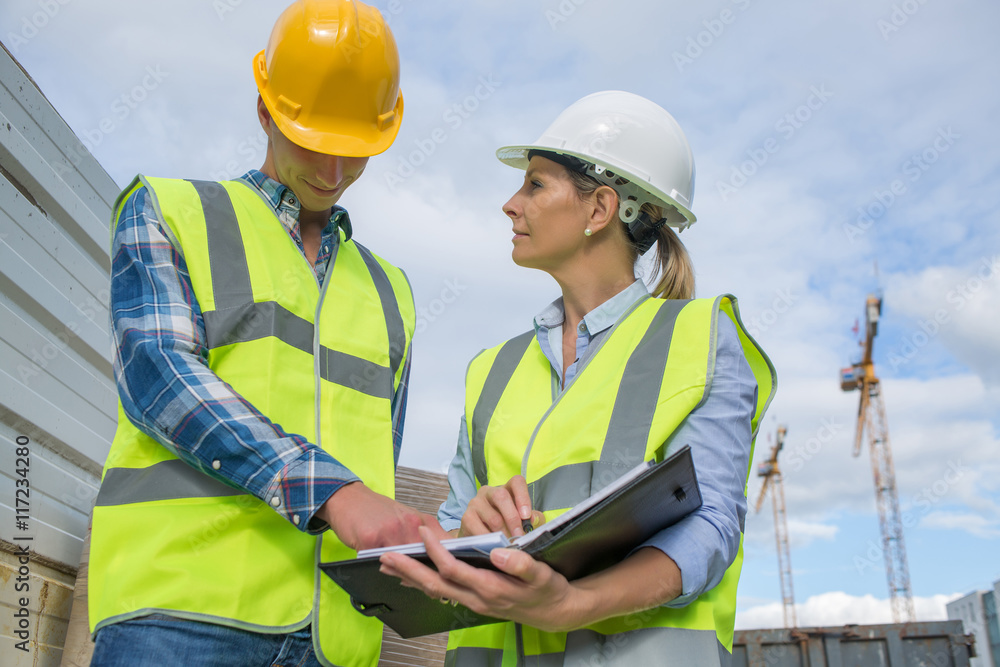 Portrait of builder works at construction site Portrait of builder works at construction site