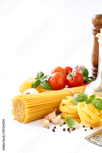 Fettuccine and spaghetti on white background