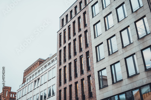 City scene from low angle view with row of offices © Robert Herhold