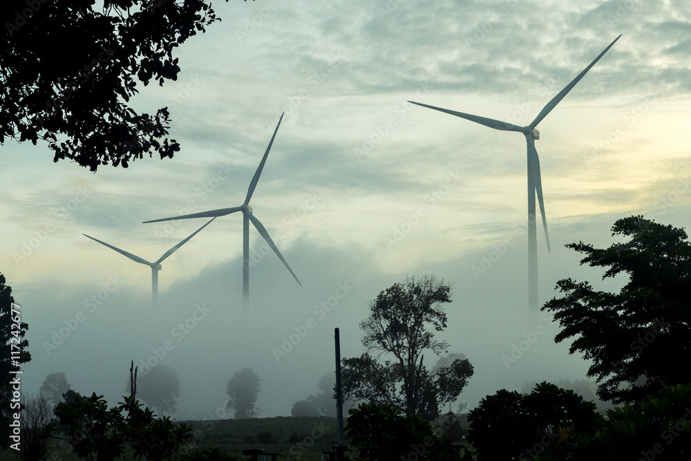 windmill on mist and sunrise windmill on mist and sunrise