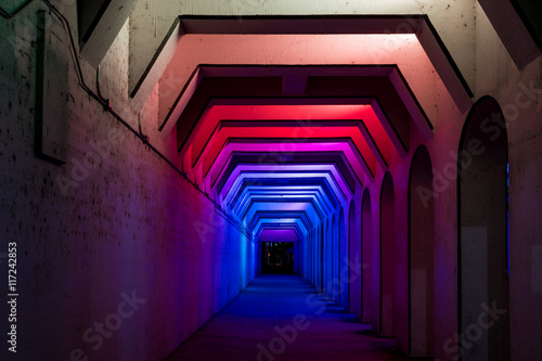 A Colorful Sidewalk Tunnel Abstract