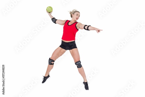 Female athlete with elbow pad throwing handball © WavebreakMediaMicro