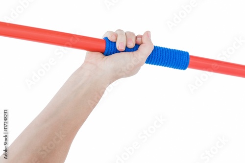 Tableau sur toile Close up of a hand holding a javelin