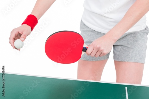 Female athlete playing ping pong