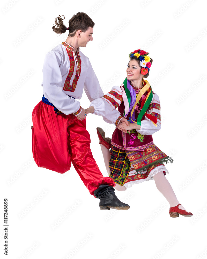 dancing couple in polish national traditional costume jumping, full length portrait isolated
