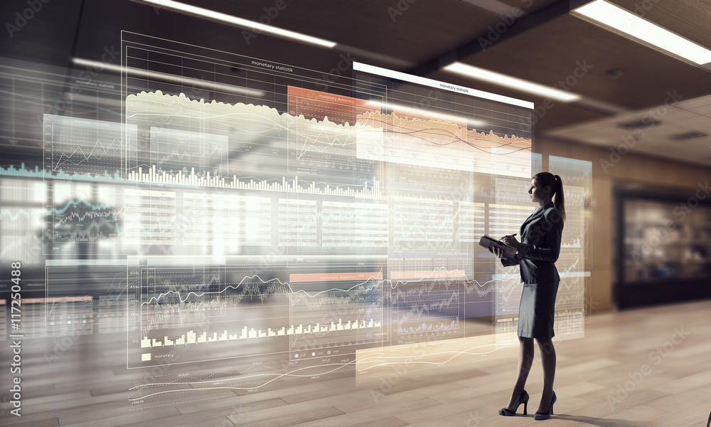 Fototapeta premium Businesswoman in modern office interior . Mixed media