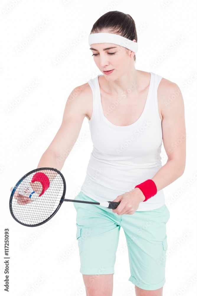 Female athlete playing badminton 