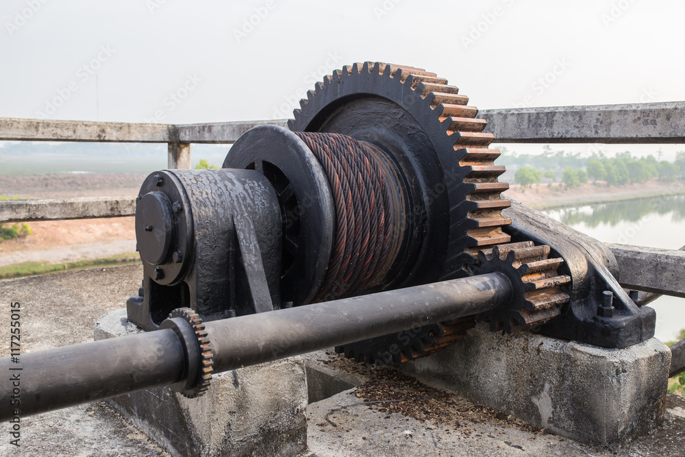 mechanical gear with a large toothed wheel of Floodgate valve mechanical gear with a large toothed wheel of Floodgate valve