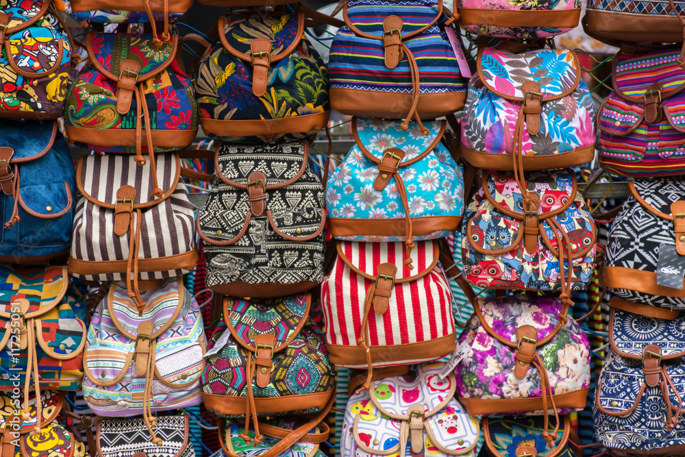 group of colors bags in an european street market