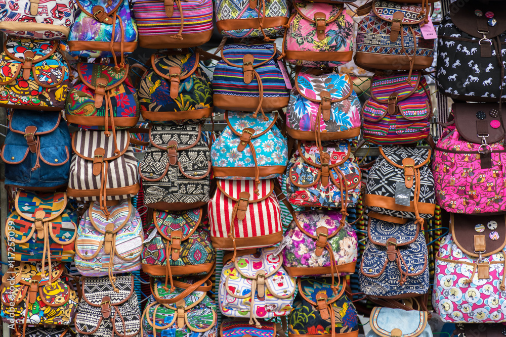 group of colors bags in an european street market