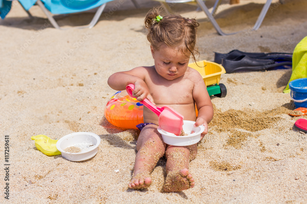 Little Girl Playing On The Beach Little Girl Playing On The Beach