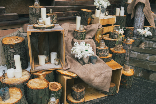 Rustic wedding decor, stairs with decorated stumps and boxes