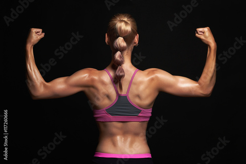 The Back Of Sports Women On Training, Fitness Girl With Muscular Body, Do  Her Workout Stock Photo, Picture and Royalty Free Image. Image 44694823.