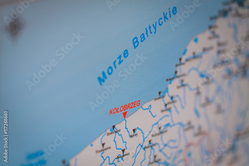 Fotografie Kolobrzeg marked with a red arrow on the tourist information board