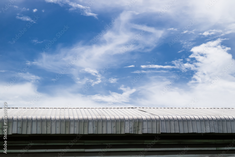 Metal sheet roof building with blue sky background