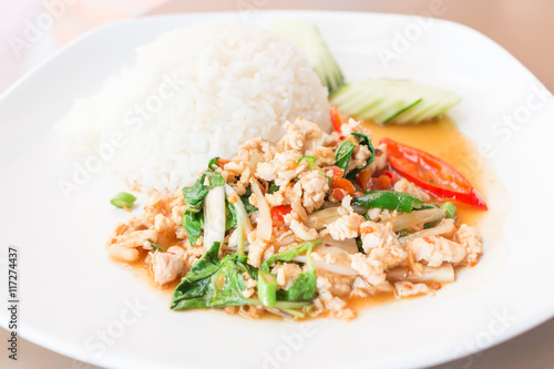 Rice topped with stir-fried pork and basil