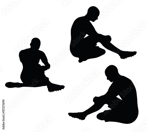 soccer player silhouette in black