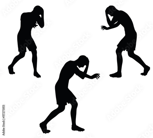 soccer player silhouette in black