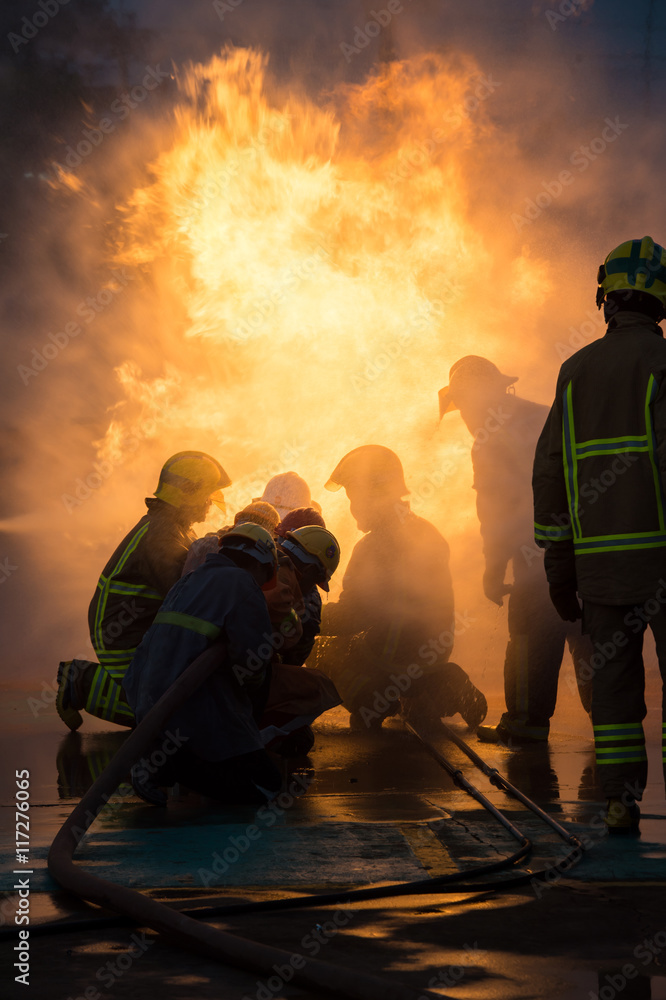 Naklejka premium Firefighters training