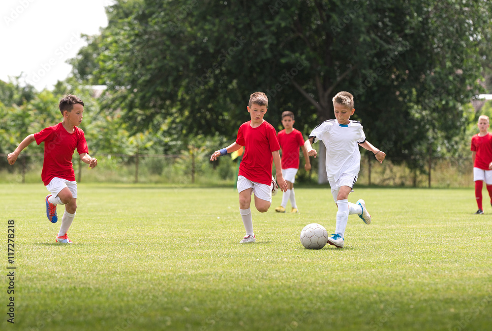 Boys on the football training on the court Boys on the football training on the court
