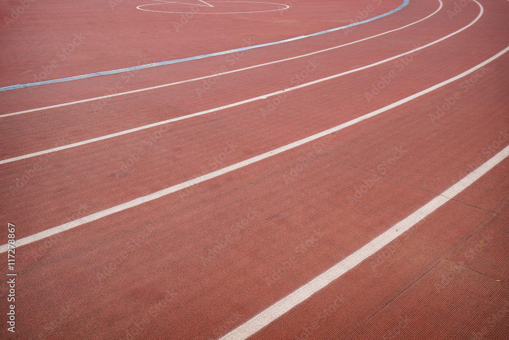 Red track in stadium for athlete, jogging, relax, walk and running