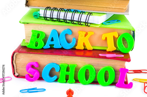 Group School supplies with the inscription: Back to school, isolated on white background.