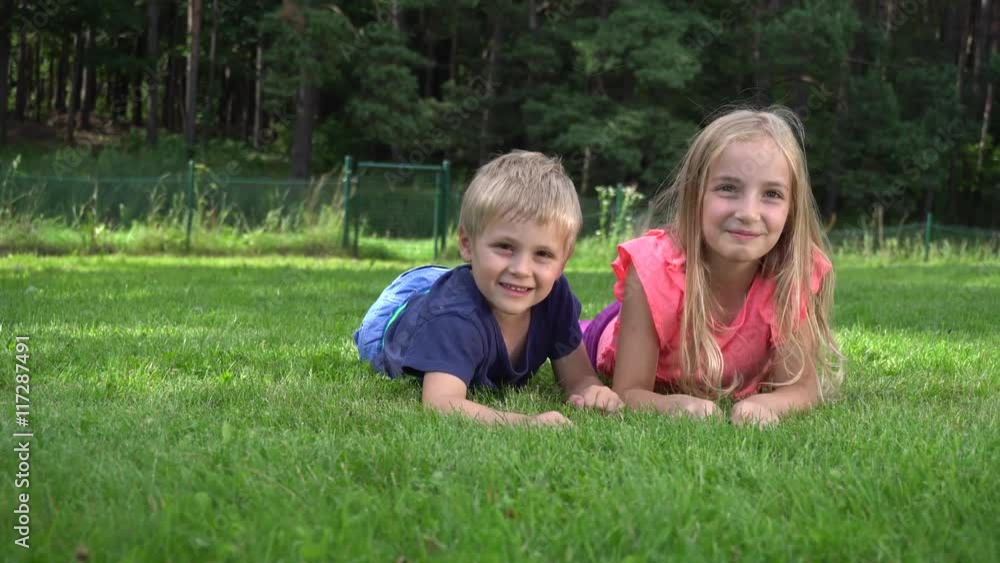 children playing on the grass children playing on the grass