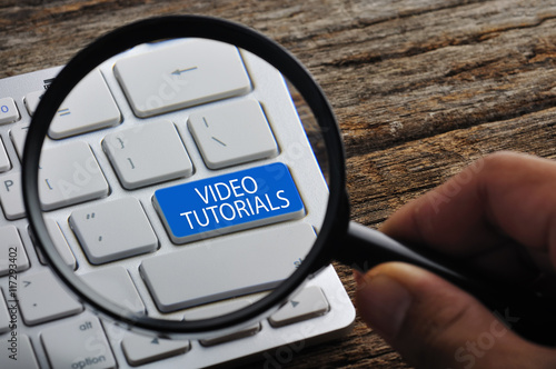 Hand Holding Magnifying Glass with 