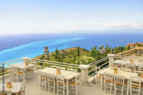 Luxury terrace balcony of exclusive seaside resort with fancy ta