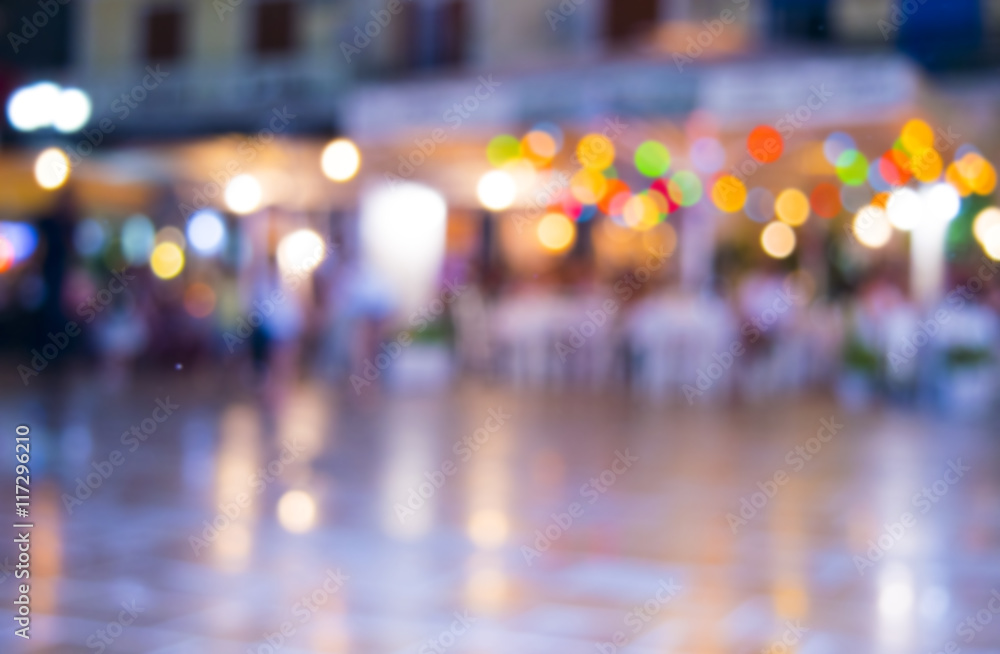Fototapeta premium image of blur restaurant in night time with bokeh for background
