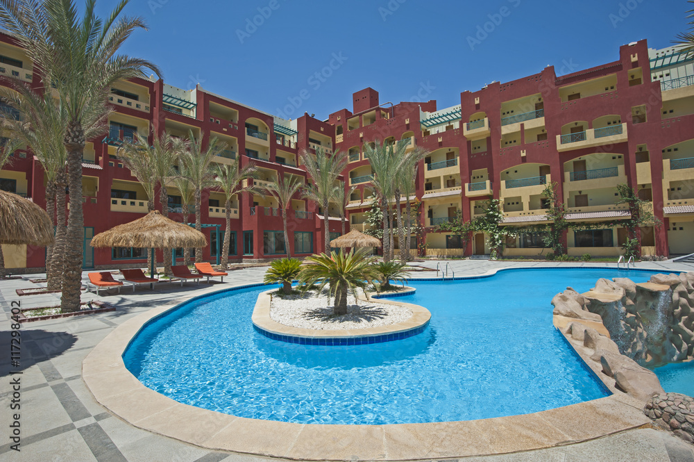 Swimming pool in luxury tropical hotel resort