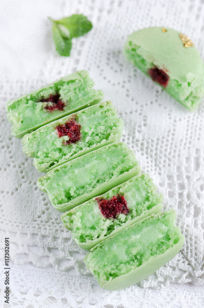 Green macaron with fresh mint Green macaron with fresh mint