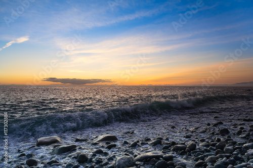 Sunset over the coast of Atlantic ocean