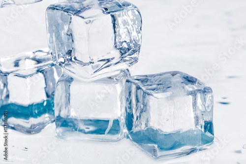 Ice cubes on table