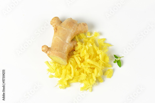 whole and grated ginger root photo