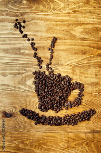 Coffee beans wooden background