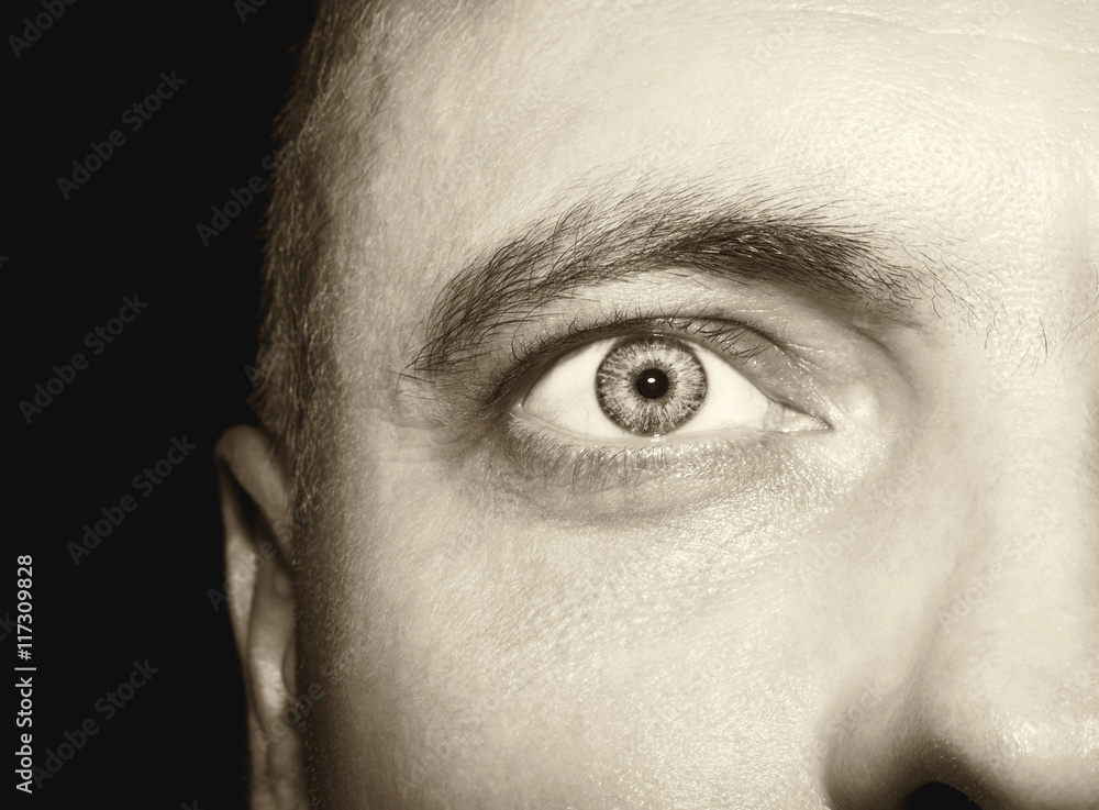 Obraz premium Image of man's vintage eye close up.