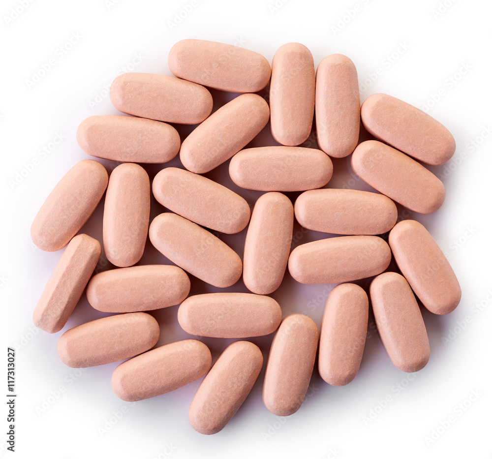 Stack of orange dietary supplements