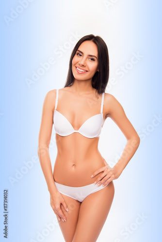 Sexy beautiful girl demonstrate her perfect body in white linger © deagreez