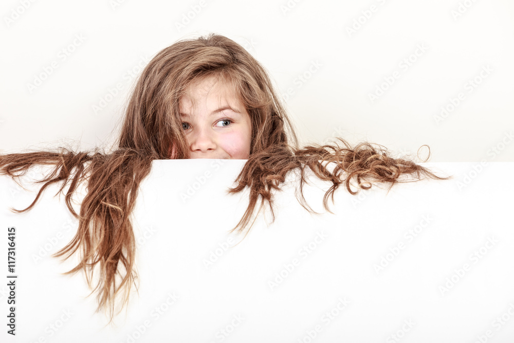Little girl kid with long hair holds empty banner. Little girl kid with long hair holds empty banner.