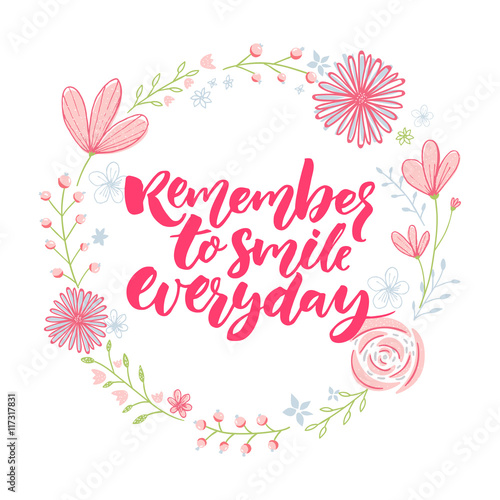 Remember to smile everyday. Inspirational saying in floral wreath. Calligraphy with flowers decorations