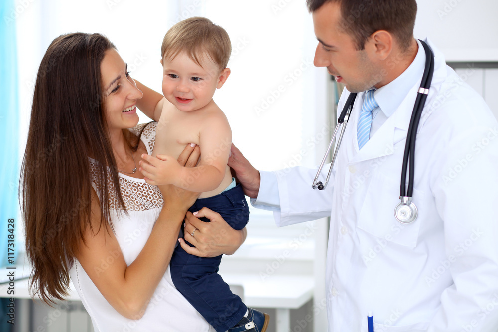 Mother with son visiting doctor. Physician and his child patient Mother with son visiting doctor. Physician and his child patient