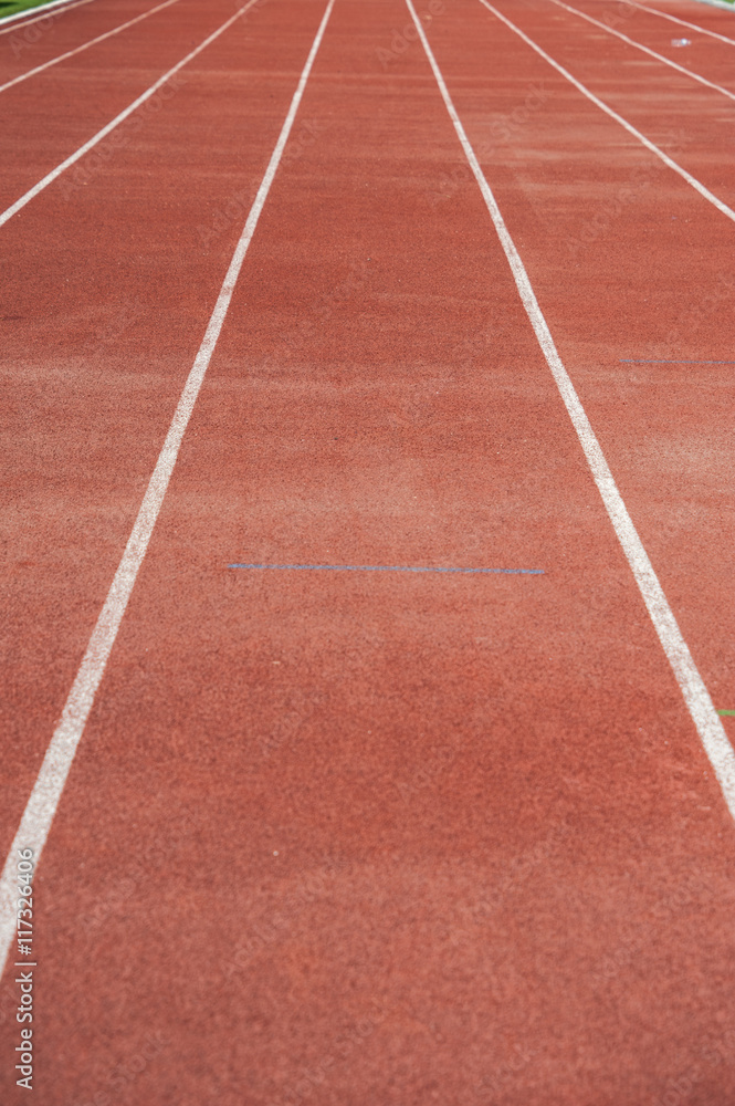 Close up : lanes of running track, Red Asphalt for runners Close up : lanes of running track, Red Asphalt for runners