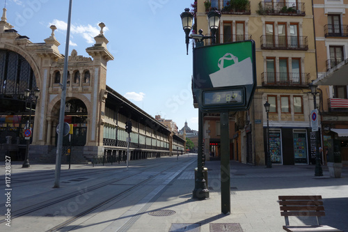 an empty street of Saragossa in summer with a thermometer showing 38 degrees